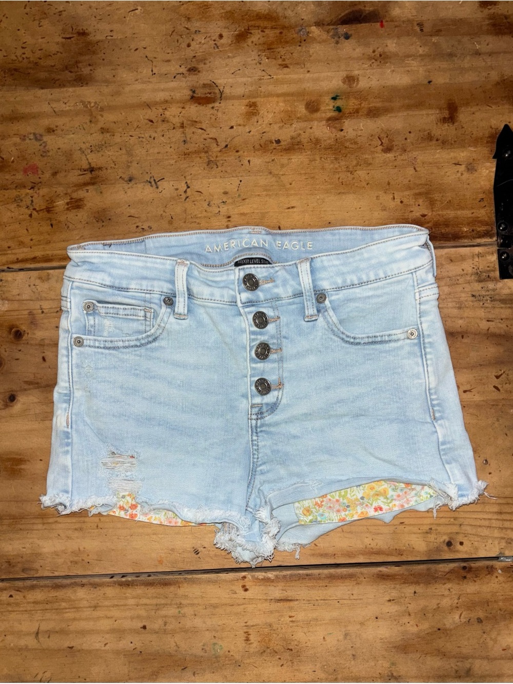 American Eagle Next Level Stretch Distressed Button Fly Denim Shorts Light Wash
